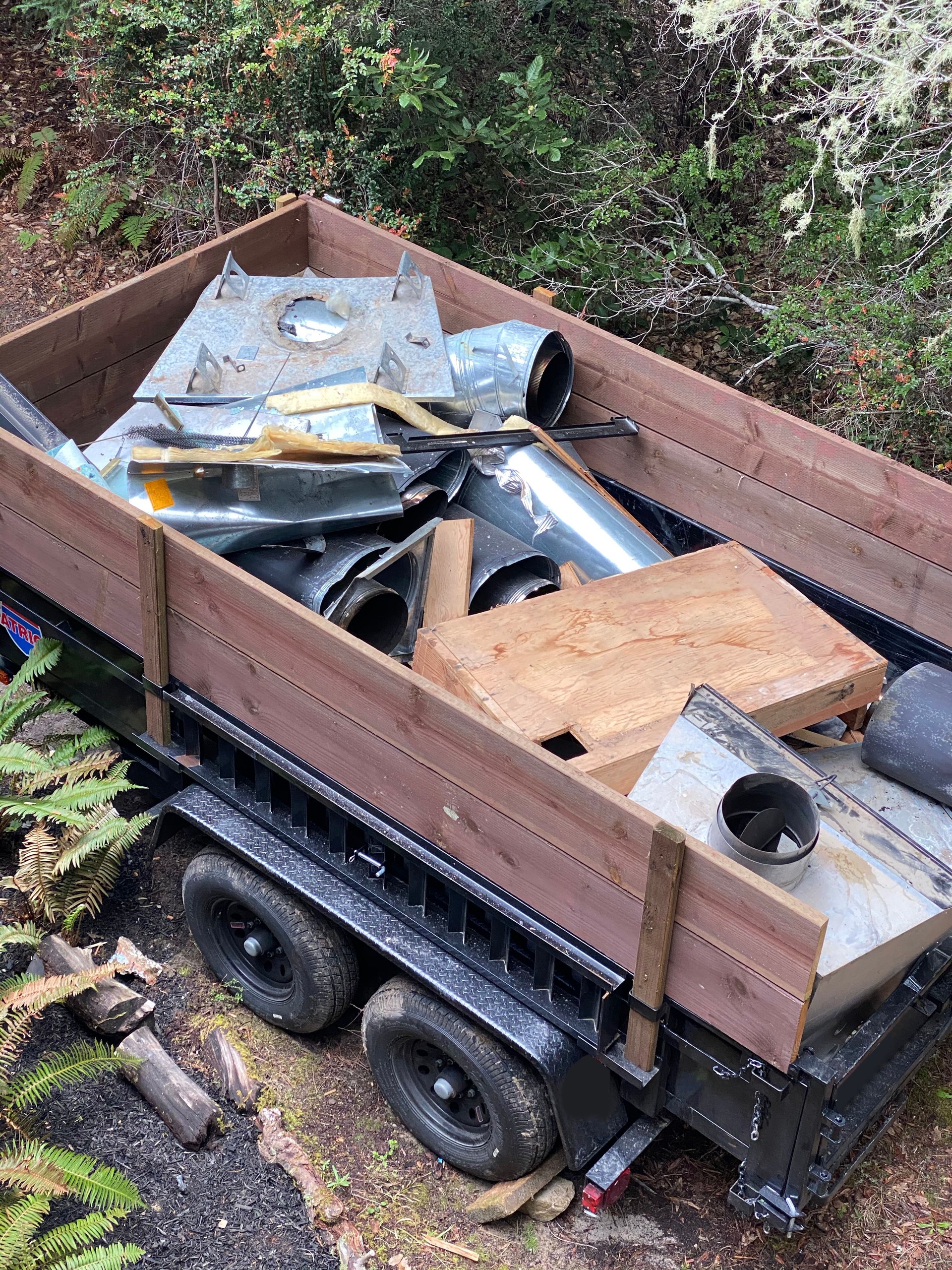 Work Trailer with chimney and junk inside